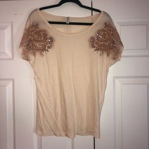 Cream top with embellished gold sleeves
